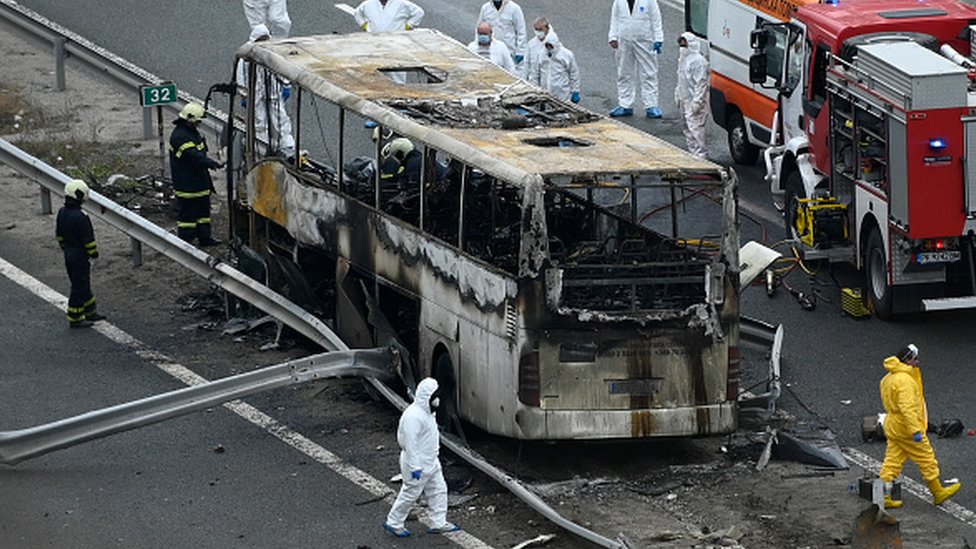 A picture of the burned-out bus on the motorway in Bulgaria