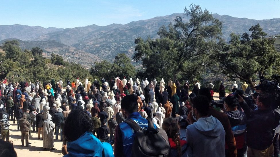 Mourners at the funeral of Rayan