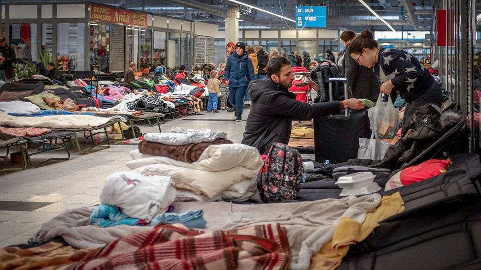 Camp beds set up in a shopping centre