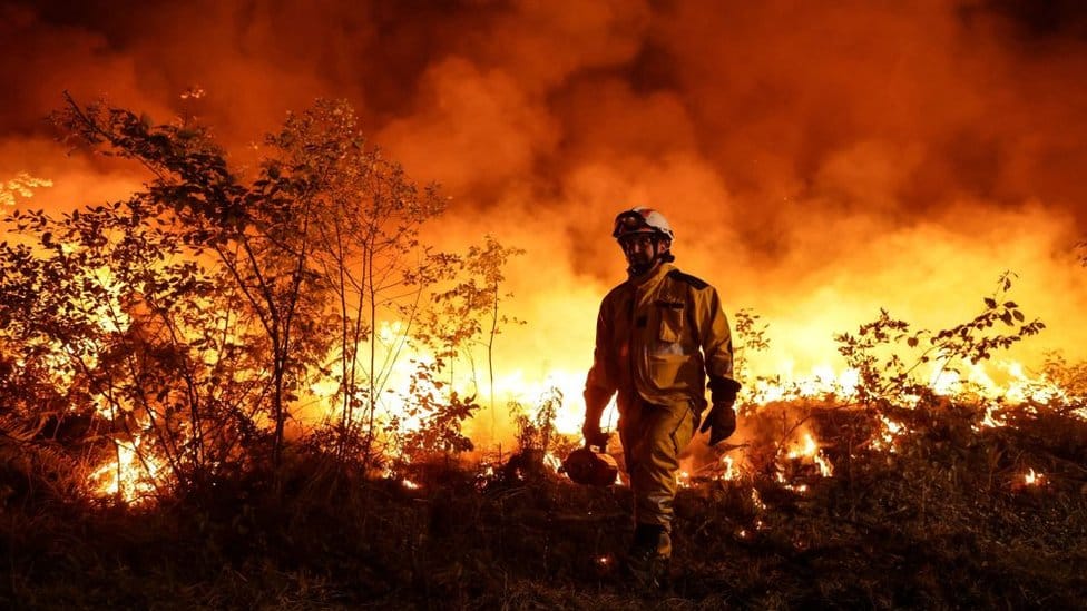 Firefighter working on fires in Louchats, south-west France