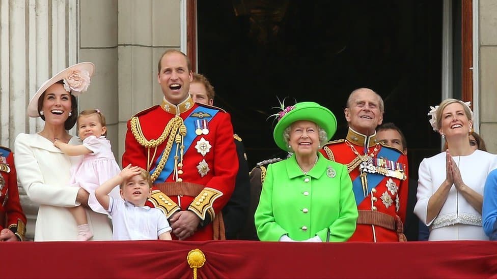 Queen Elizabeth II joins members of the Royal Family, including the Duke and Duchess of Cambridge with their children Princess Charlotte and Prince George, on the balcony of Buckingham Palace, central London after they attended the Trooping the Colour ceremony as part of Her Majesty's birthday celebrations