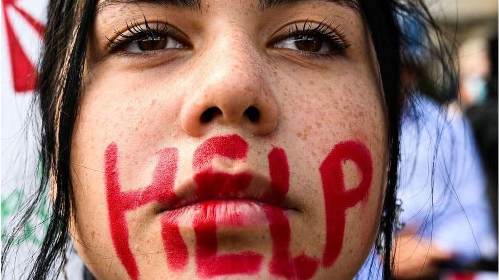 A young woman takes part in a protest on 1 October 2022 in Rome, following the death of Kurdish woman Mahsa Amini in Iran.