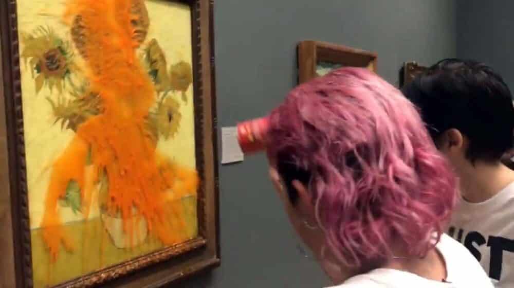 Protesters throw soup onto Van Gogh painting