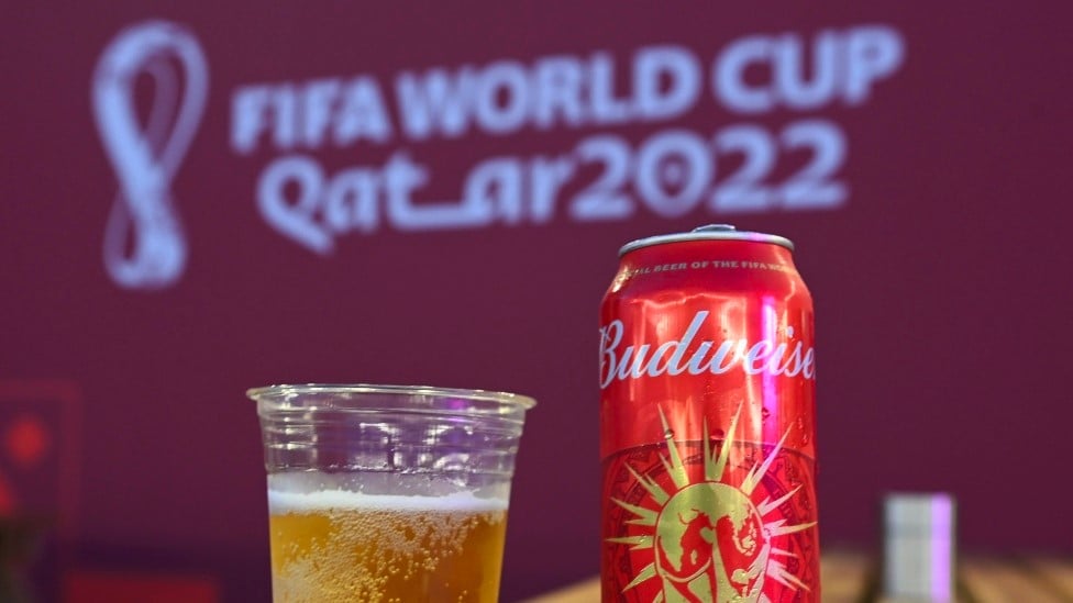 A Budweiser in front of a Qatar World Cup logo