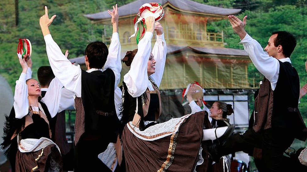 Descendants of Italian immigrants do a traditional dance in Brazil