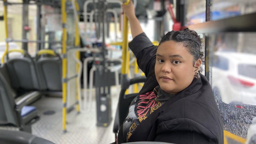 Rayane Souza sitting in a bus in the city of Vitoria