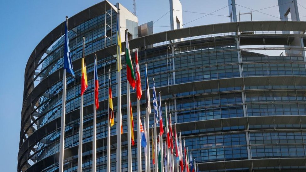 Flags in front of the European Parliament in Strasbourg, France