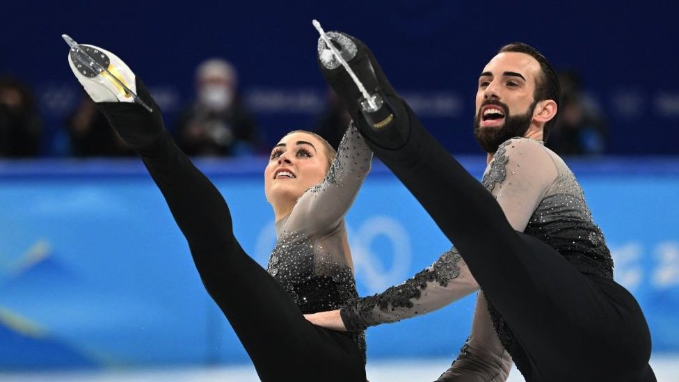 Timothy LeDuc and Ashley Cain in action during the 2022 Winter Olympics