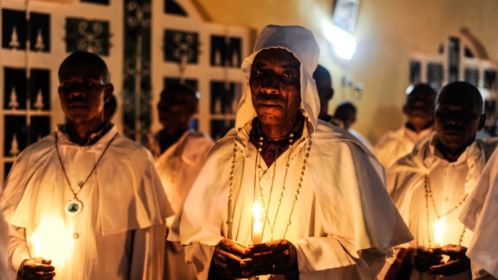 Locals of Mathare, a collection of slums, hold a mass to welcome new year in Nairobi, Kenya on December 31, 2022