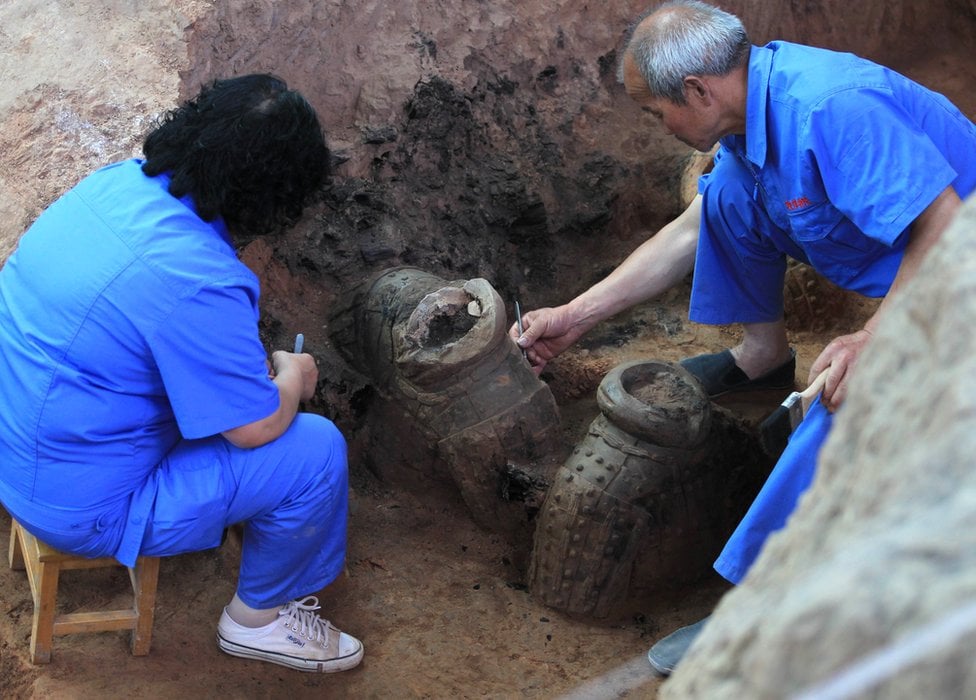 Chinese archaeologists at work in 2012 at Pit One of the Terracotta Warriors and Horses Museum in Xian