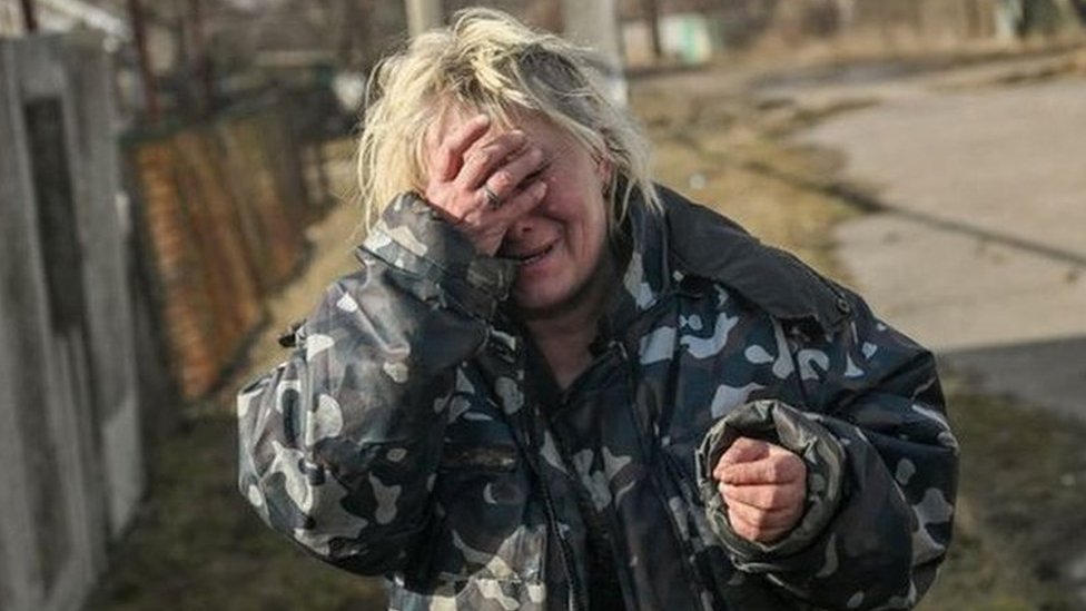 A woman cries near Bakhmut