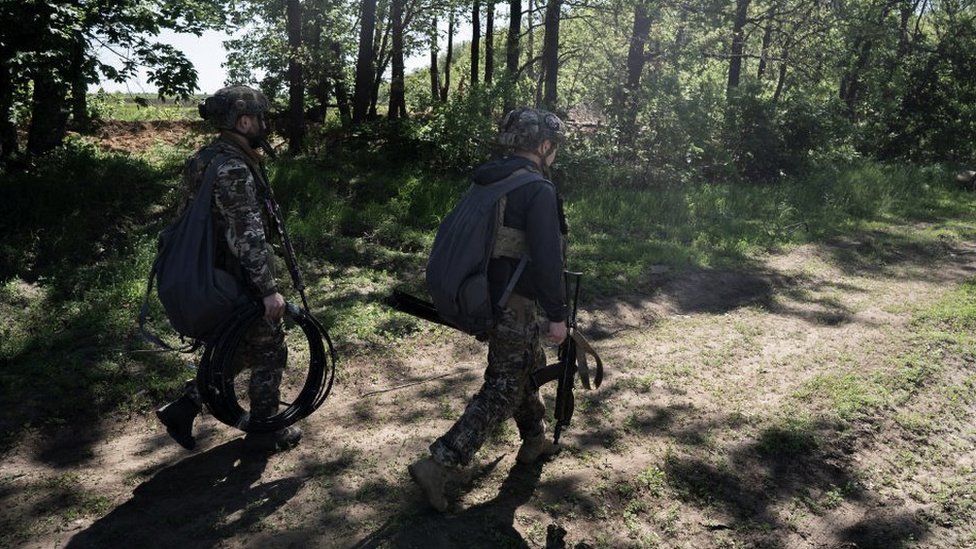 A soldier of the 28th Brigade's Aerial Reconnaissance Regiment preparing equipment on a mission to the front south of Bakhmut, Donetsk Oblast, Ukraine on May 17, 2023. (Photo by Vincenzo Circosta/Anadolu Agency via Getty Images)