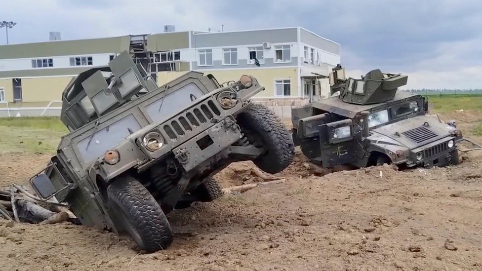 Two damaged US-made Humvee vehicles in Russia's Belgorod region