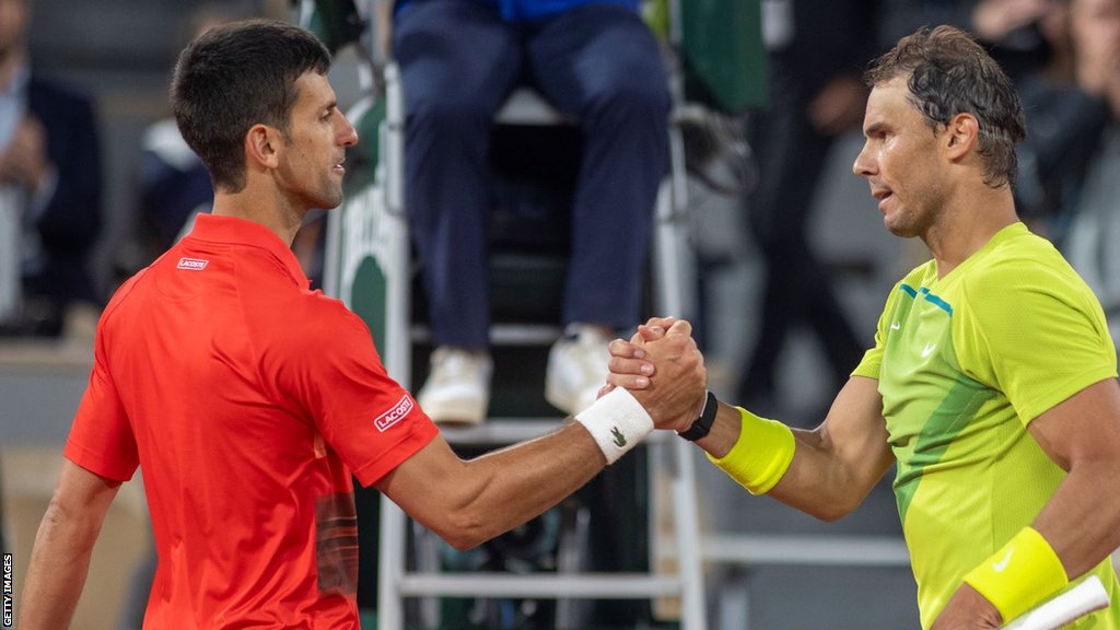 Novak Djokovic and Rafael Nadal shake hands after their 2022 French Open quarter-final