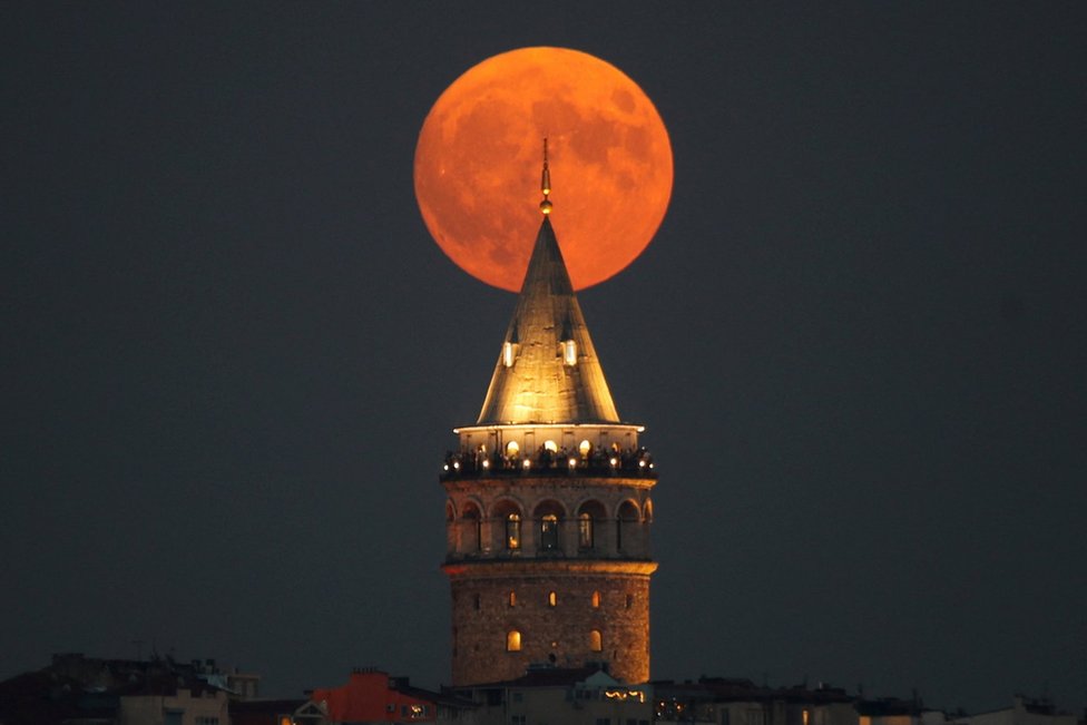 The blue supermoon is seen over the Galata Tower in Istanbul, Turkey. Photo: 30 August 2023