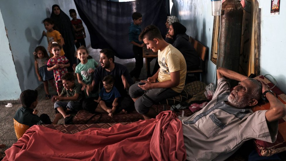 Palestinians taking refuge in a school