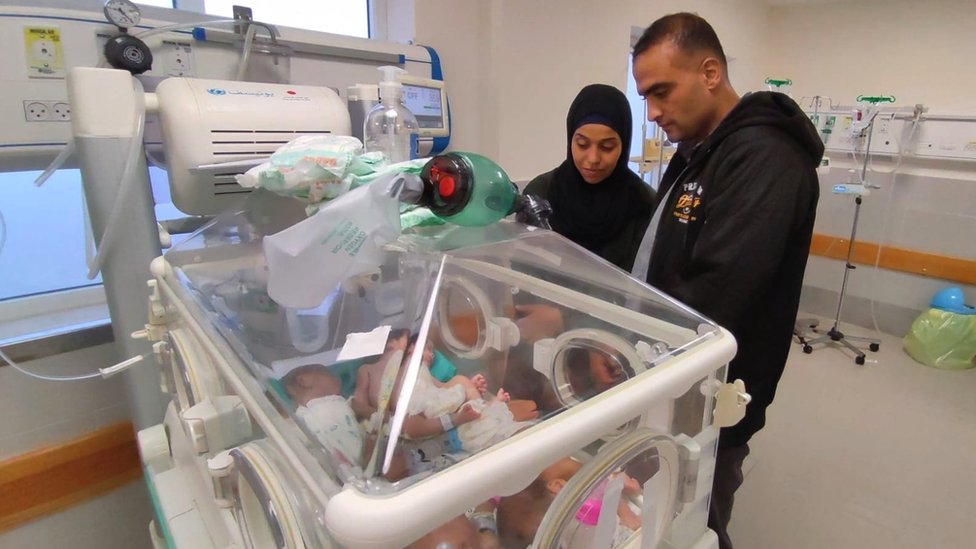 Warda and Ali Sebeta are reunited with their premature baby son Anas in Al Hilal Emirates Hospital in southern Gaza