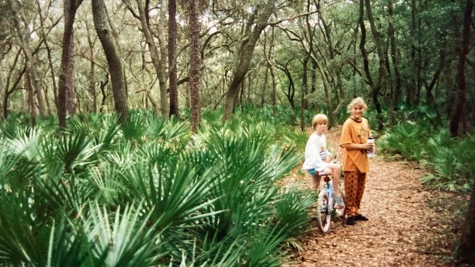 Sarah Ott [right] as a child