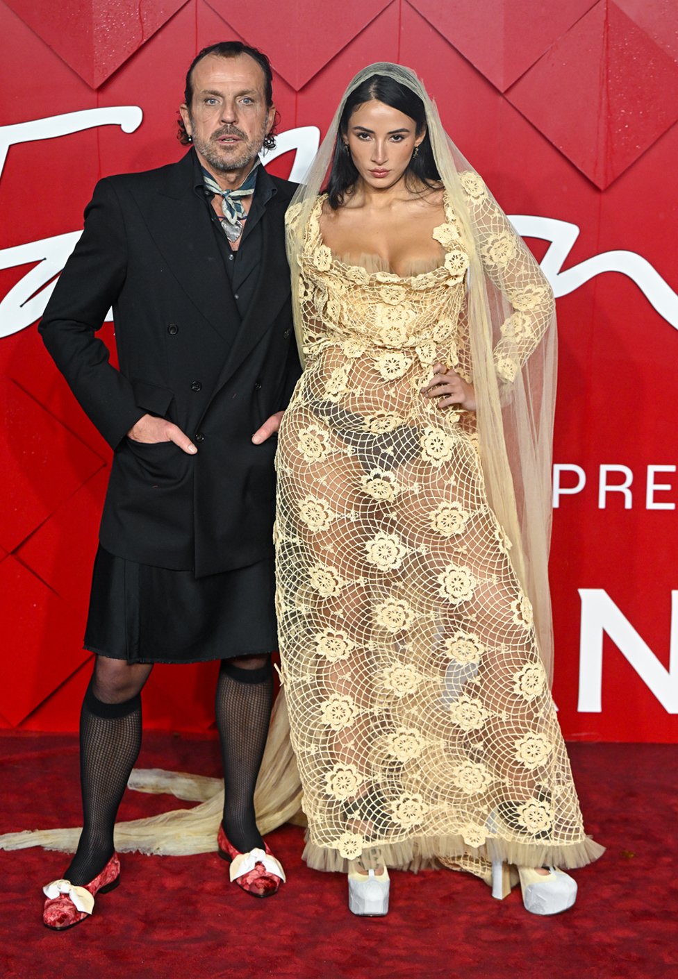 Andreas Kronthaler and Cora Corré attend The Fashion Awards 2023 presented by Pandora at the Royal Albert Hall on December 04, 2023 in London, England.