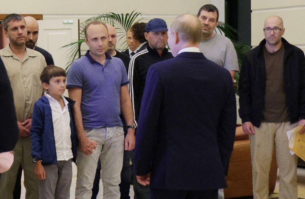epa11517267 Russian President Vladimir Putin meets Russian citizens released after the Russian-US prisoner swap in Turkiye at Vnukovo International Airport in Moscow, Russia, 01 August 2024. On August 01, Ankara hosted the Russian-US exchange of 26 individuals held in prisons in the United States, Germany, Poland, Slovenia, Norway, Russia, and Belarus. Ten of the prisoners exchanged, including two minors, went to Russia, 13 to Germany, and three to the US. Those returned to Russia include Artem and Anna Dultsev with their children, Vadim Krasikov, Pavel Rubtsov, Mikhail Mikushin, Roman Seleznev, Vladislav Klyushin, and Vadim Konoshchenok. 