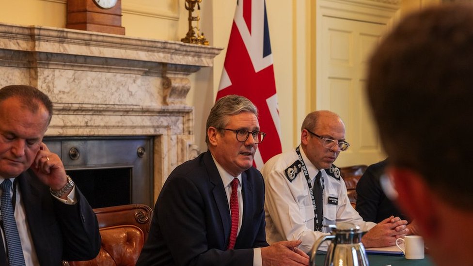 British Prime Minister Keir Starmer (C) meets with senior policing leaders at Downing Street in London, britain, 01 August 2024. A London protest, in which more than 100 people were arrested, is the latest sign of political and racial tension that poses a challenge to Starmerless than a month into his tenure, following a riot on Tuesday 30 July by far-right demonstrators in Southport, the town where the three girls were killed on 29 July.