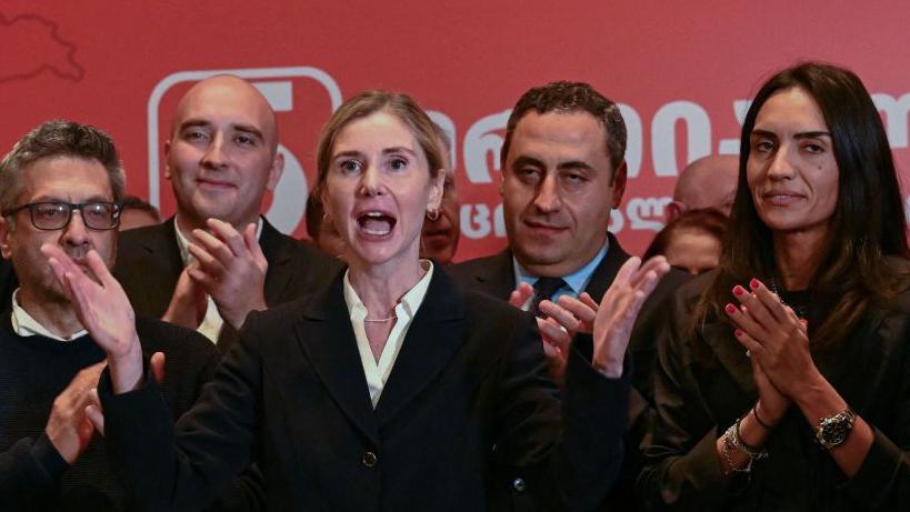 Tina Bokuchava, the chair of the United National Movement opposition party, gives a speech during a gathering at the party's headquarters after exit polls were announced during parliamentary elections in Tbilisi on October 26, 2024